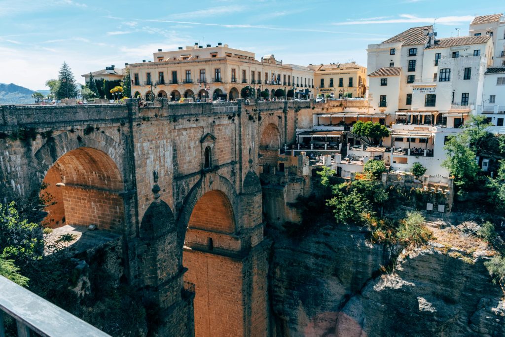 Ronda historic town perched on dramatic cliffs above El Tajo gorge in southern Spai