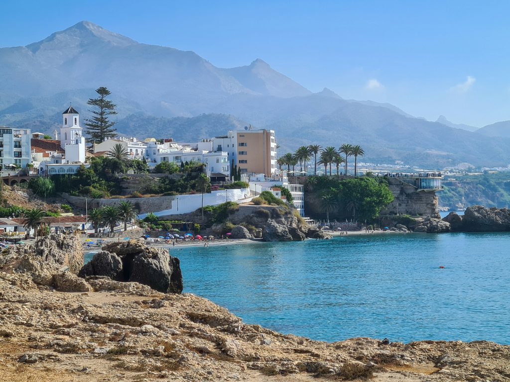 Nerja coastline with turquoise beaches and cliffs near the famous Nerja Caves in Andalusia