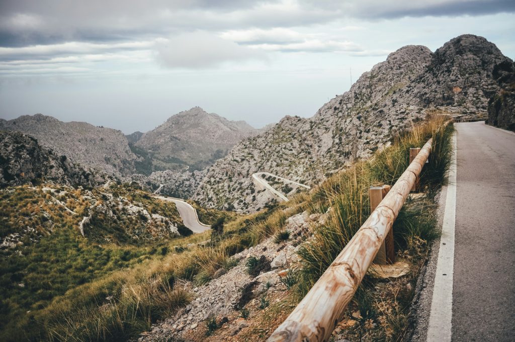 Serra de Tramuntana mountain range in Mallorca with winding roads and dramatic landscapes