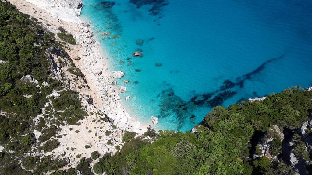 Cala Mondragó natural beach in Mallorca with clear water surrounded by protected parkland