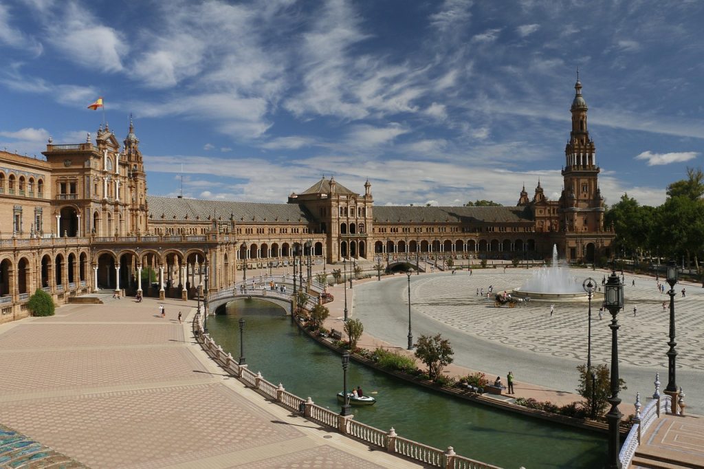 Real Alcazar of Seville palace courtyard with Moorish architecture in Spain