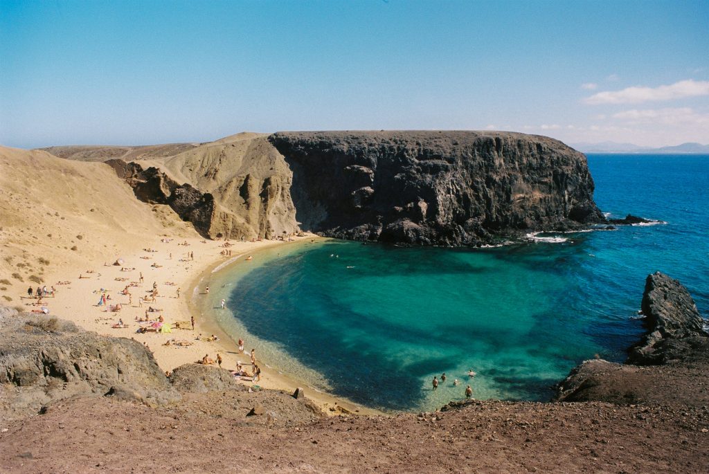 Lanzarote volcanic landscape with lava fields, black sand beaches, and minimalist architecture