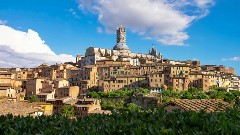 Siena medieval old town with Piazza del Campo and historic brick buildings in Tuscany