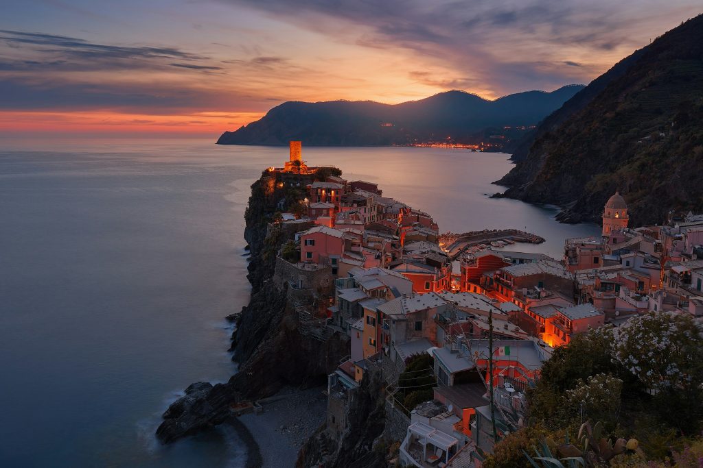 Italy landscape with historic cities, coastline and mountains