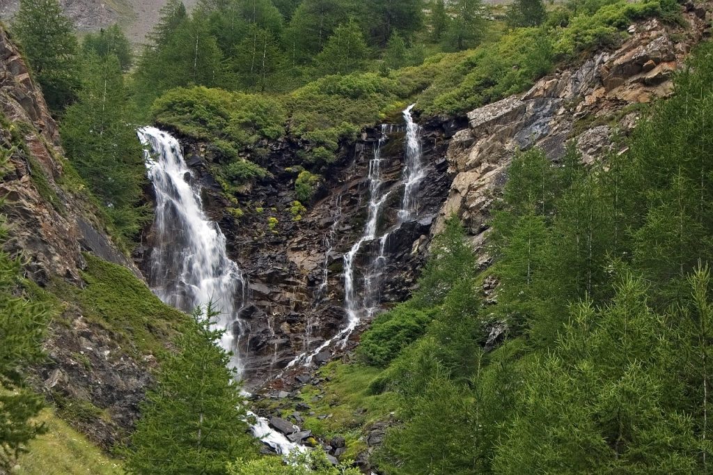 Lush green Valle delle Ferriere nature reserve near Amalfi, featuring waterfalls, forest trails, and historic paper mills.