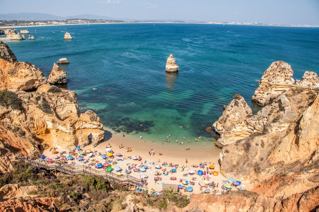 Praia do Camilo beach near Lagos Algarve with wooden staircase
