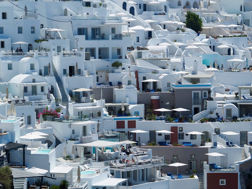 Imerovigli village in Santorini with dramatic cliff views and whitewashed houses along the caldera