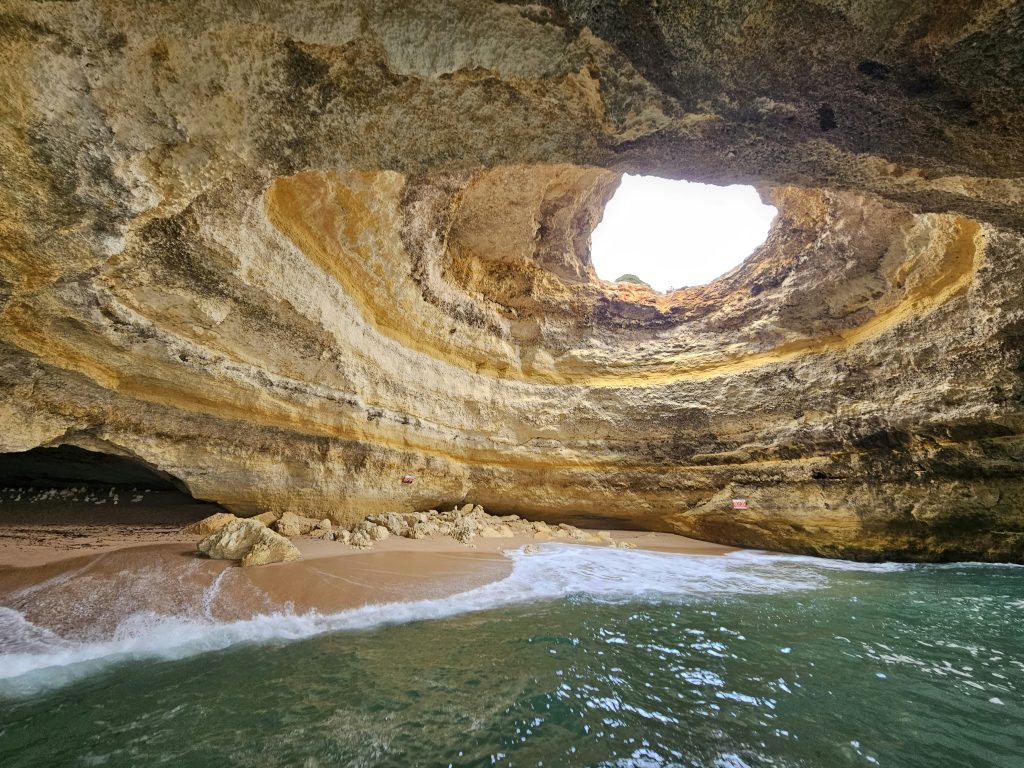 Benagil Cave in Algarve Portugal with circular skylight opening