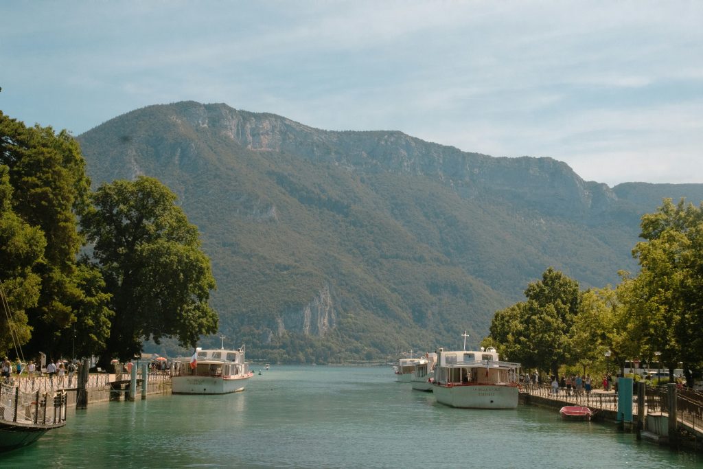 Lake Annecy with clear water and surrounding mountains