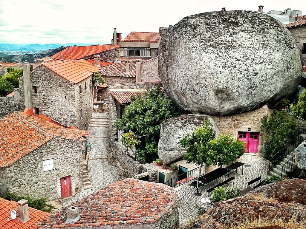Monsanto village built among massive granite boulders, showcasing stone houses integrated into the rocky landscape of rural Portuga