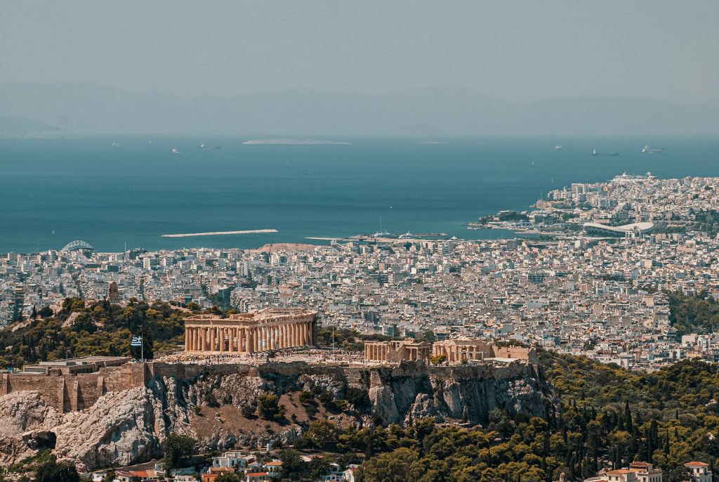 Acropolis and Parthenon overlooking Athens city skyline in Greece