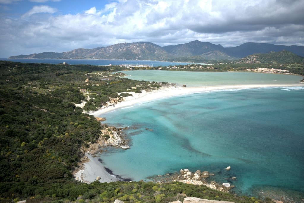 Villasimius beach in southern Sardinia with soft white sand, shallow turquoise water, and easy access for relaxed beach days