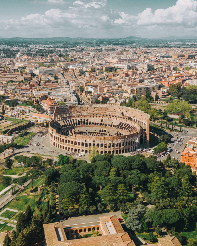 Rome city skyline with ancient ruins, historic buildings, and Italian architecture