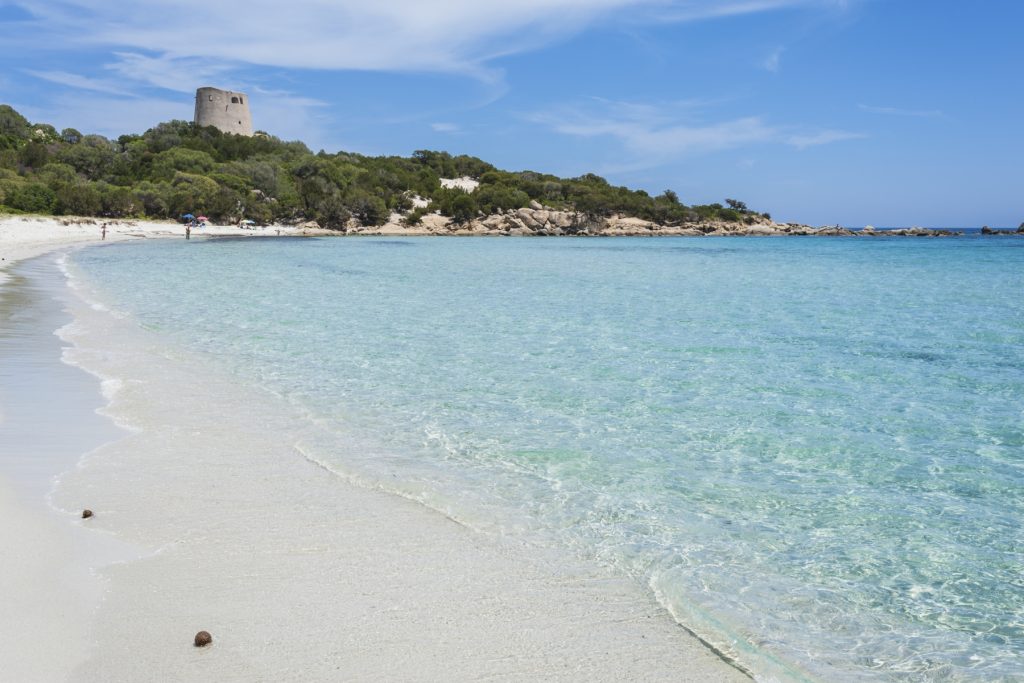 Costa Rei coastline in Sardinia showing a long sandy beach, clear blue sea, and wide open space ideal for peaceful seaside walks