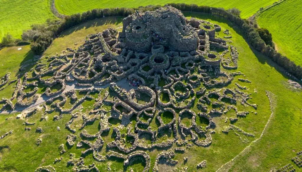 Nuraghe Su Nuraxi archaeological site in Sardinia, ancient prehistoric stone towers and ruins