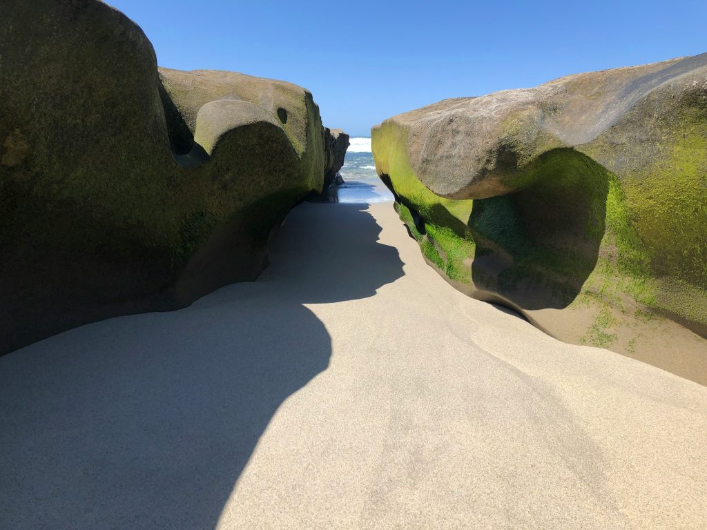 Scenic coastal drive in Sardinia connecting multiple turquoise beaches and hidden coves