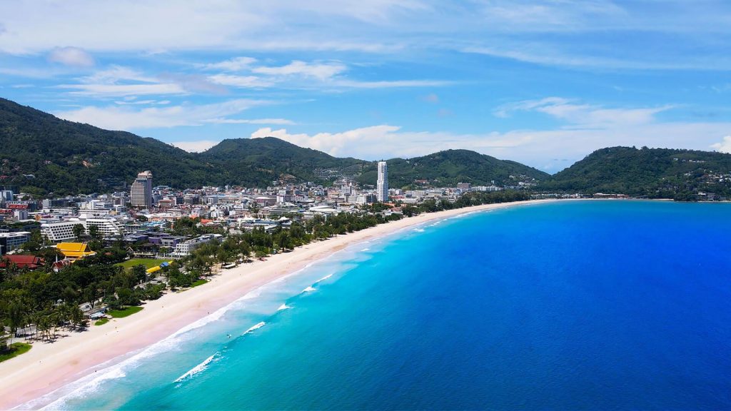 Patong Beach Phuket Thailand tropical beach with boats nightlife area and Andaman Sea