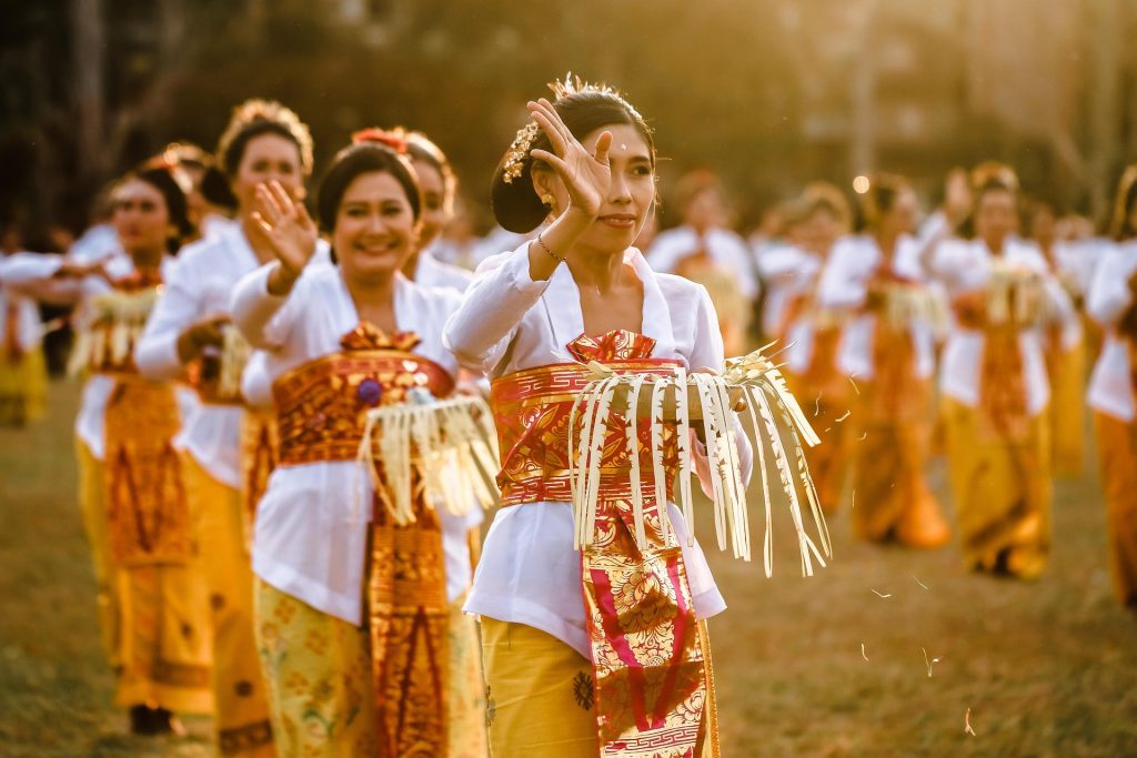 Bali travel guide traditional Balinese ceremony with cultural rituals and temple setting