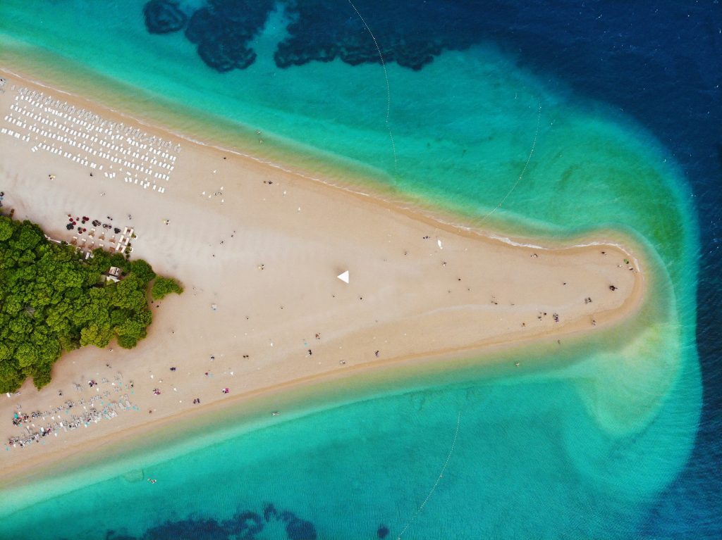 Zlatni Rat beach Brač Croatia aerial view turquoise water unique shape coastline