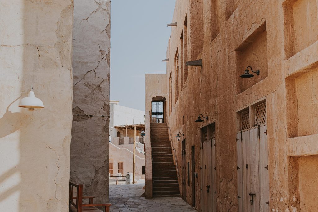 Al Fahidi historical district in Dubai with traditional wind towers and old architecture