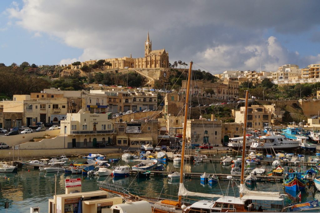 Malta travel guide Gozo island cliffs coastal views villages nature Mediterranean landscape