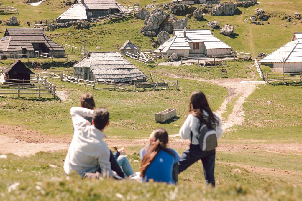 Velika Planina Slovenia traditional wooden huts alpine plateau mountain landscape
