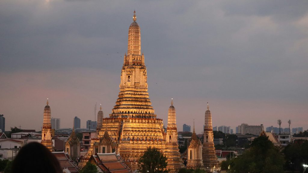 Wat Arun Temple of Dawn Bangkok Thailand riverside temple at sunset