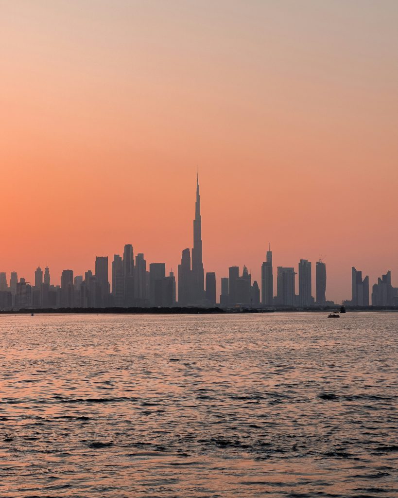 Dubai Creek with traditional wooden boats and old city views