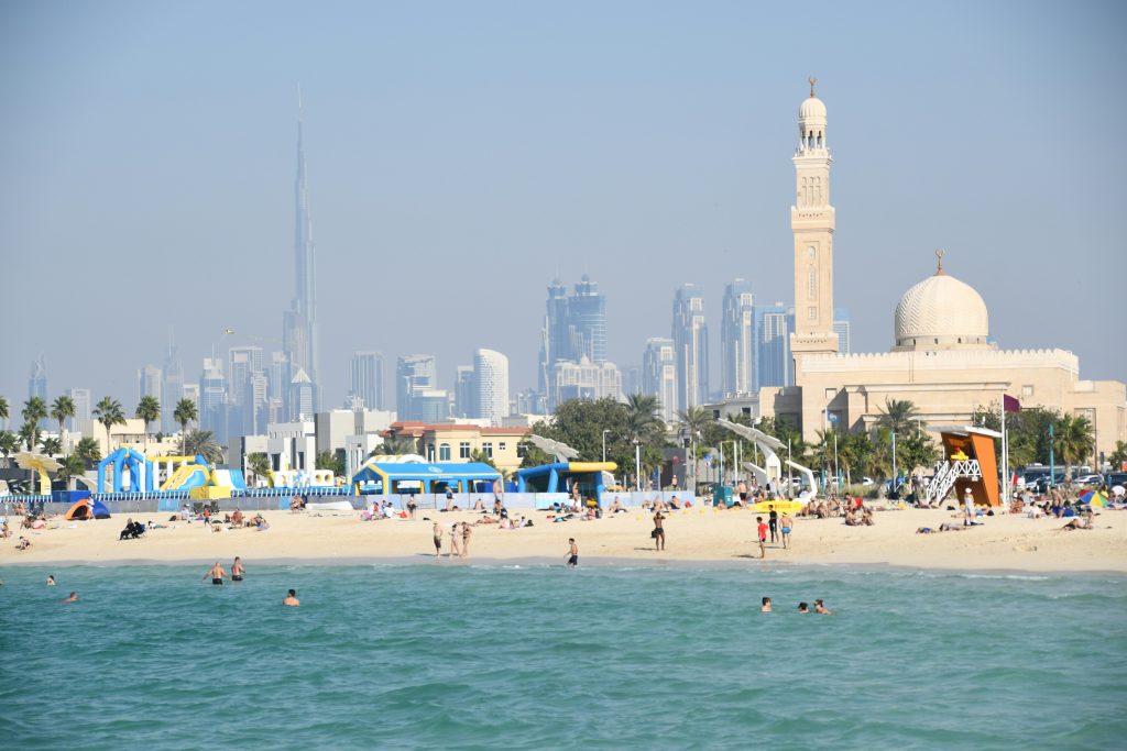 Kite Beach in Dubai with people, kitesurfing, and open beach area