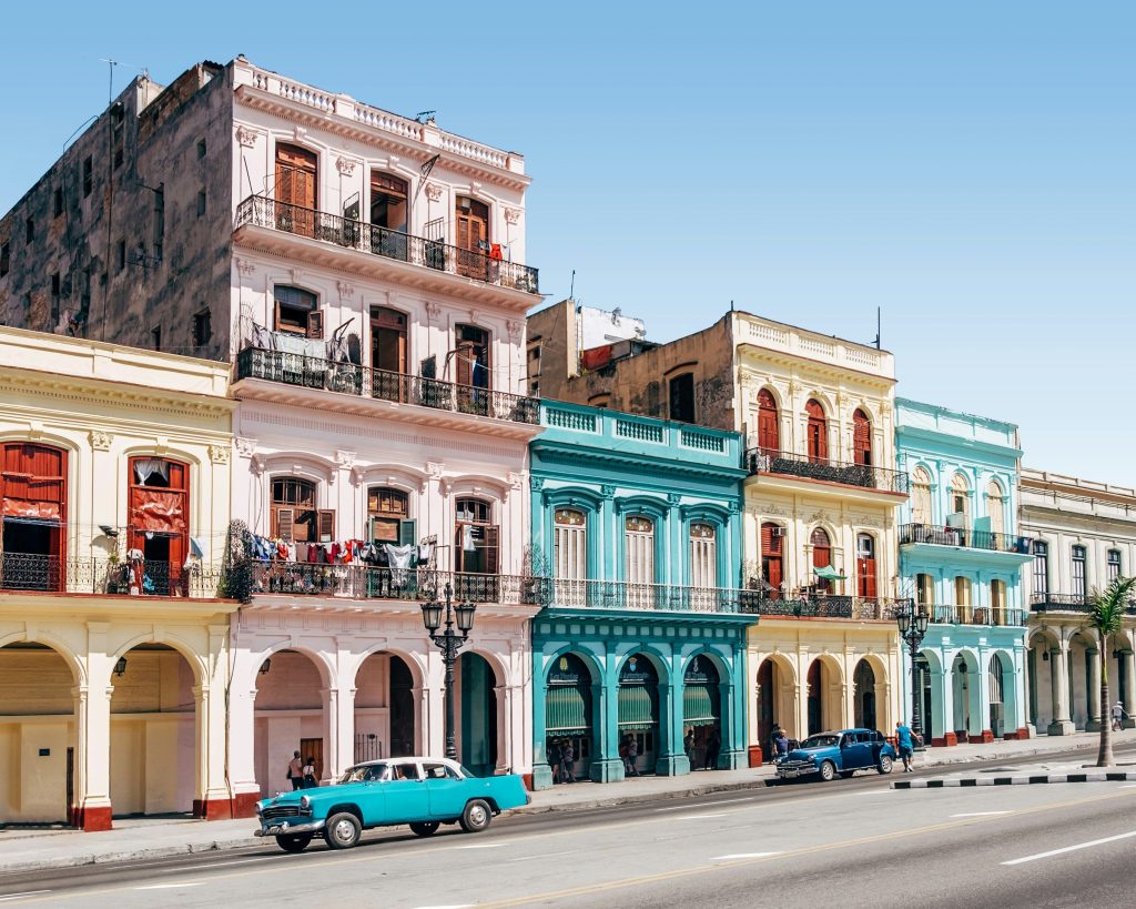 Colorful colonial streets and vintage American cars in Havana Cuba travel guide historic city