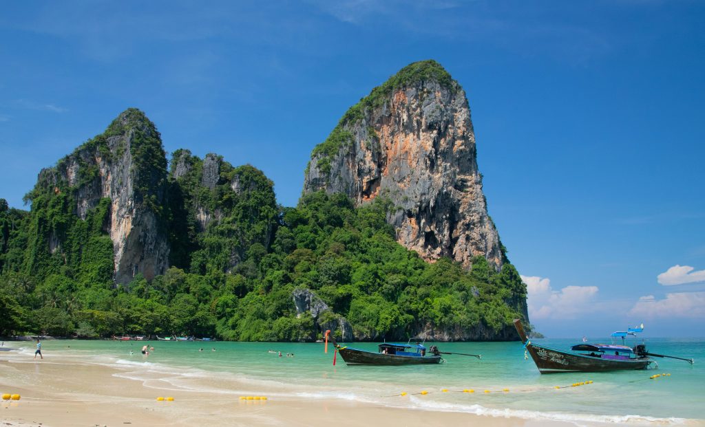 Railay Beach Krabi Thailand surrounded by limestone cliffs and turquoise tropical water