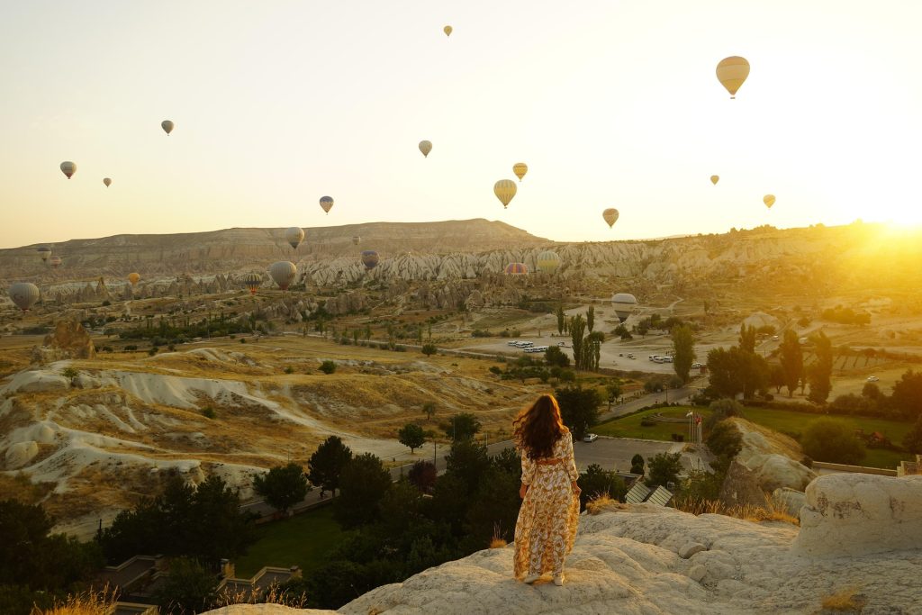 Cappadocia best photo spots with hot air balloons, cave hotels, and valley viewpoints at sunrise