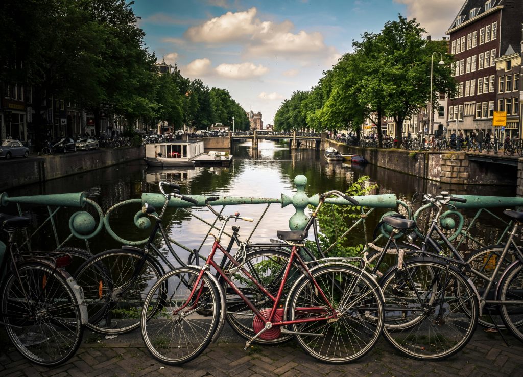 Bicycles parked in Amsterdam city center – what to know before visiting Amsterdam