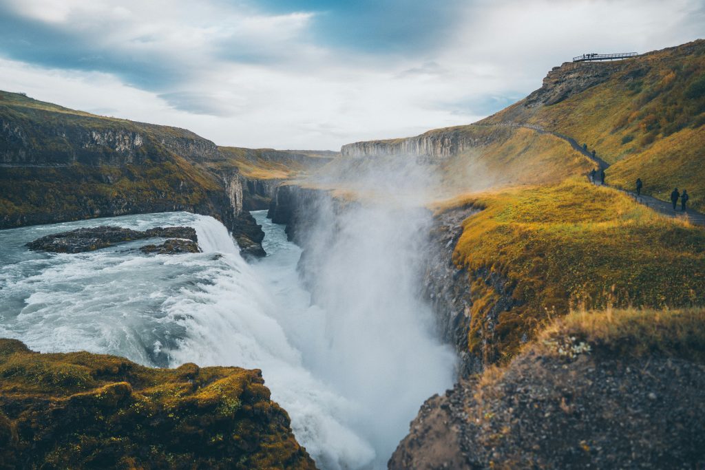 Gullfoss waterfall in Iceland with powerful water flow and natural scenery – Iceland travel guide