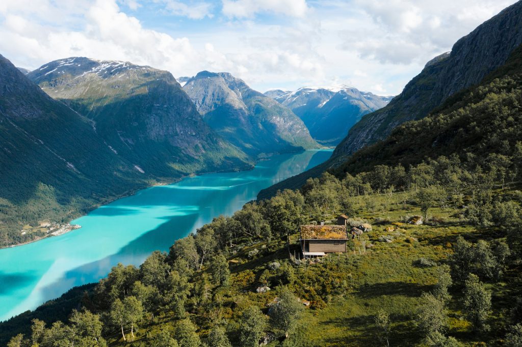 Norway fjords landscape with turquoise water, mountains, and scenic viewpoint in western Norway