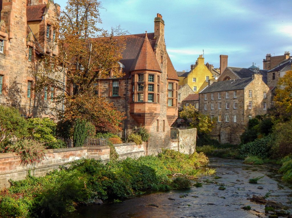 Picturesque riverside neighborhood with stone houses and peaceful surroundings