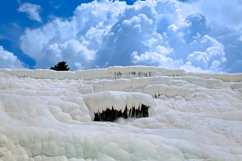 Layered travertine formations in Pamukkale showcasing the region's famous mineral-rich thermal landscape