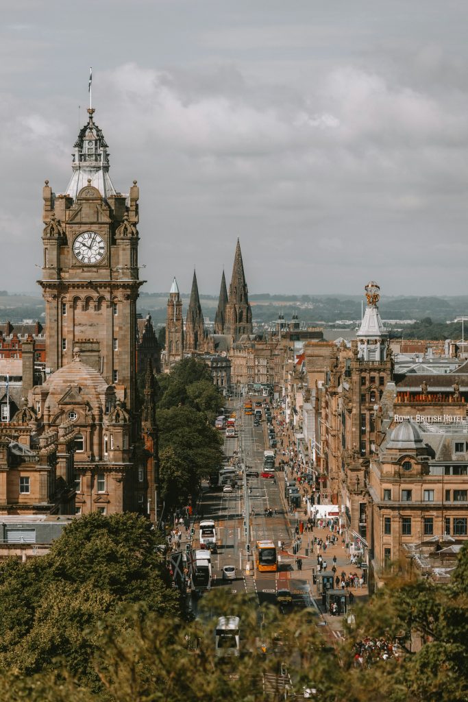 Panoramic view of Edinburgh city center with historic clock tower and skyline